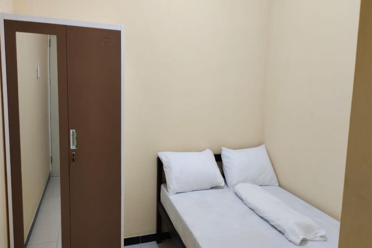 Oyo 91209 Arjuna Residence Syariah Sby สุราบายา ภายนอก รูปภาพ